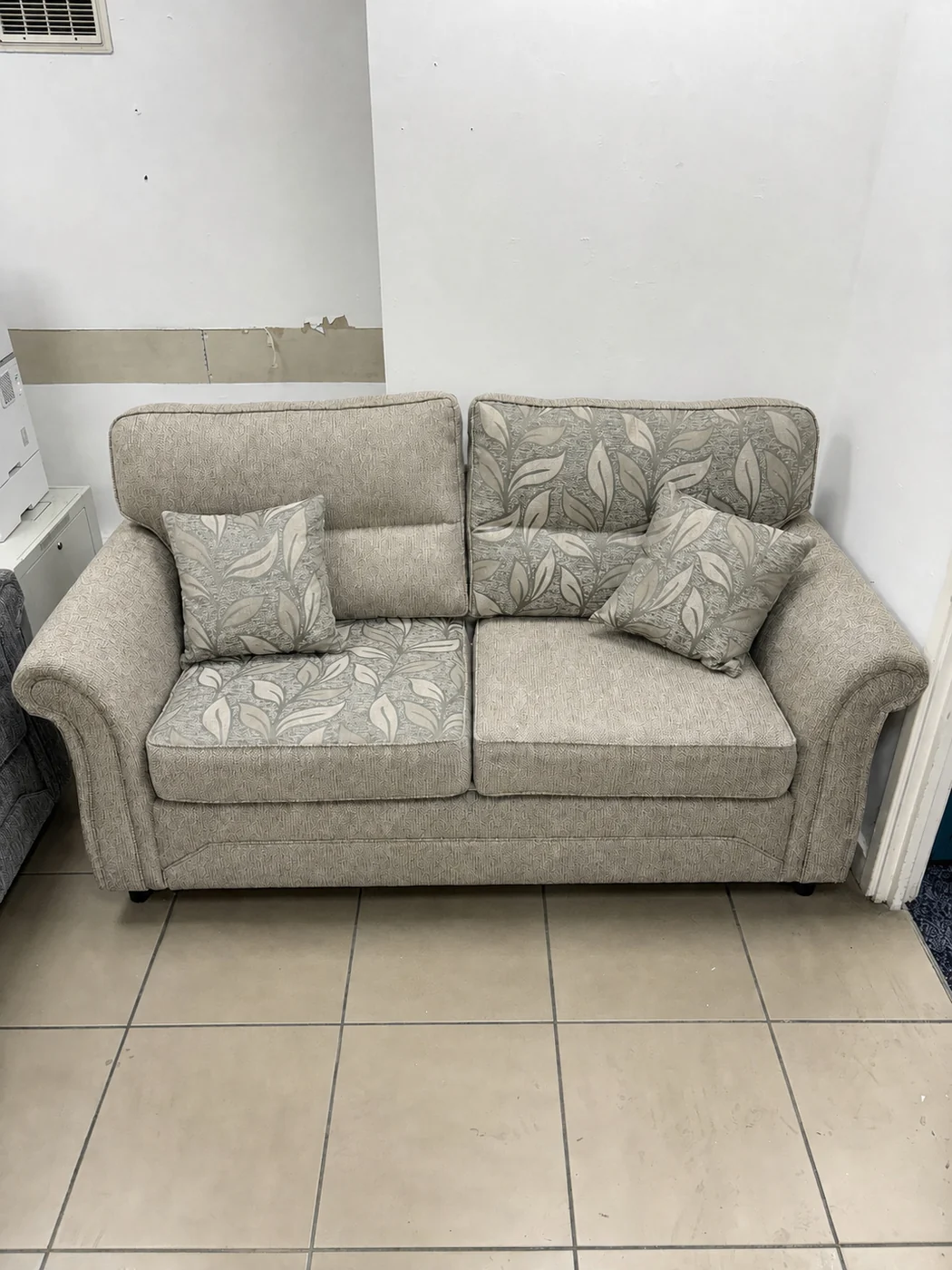 Bespoke patterned two-seater sofa in Paris Floral Beige, made to order in Ipswich